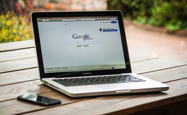 Laptop with the Google search engine on the screen